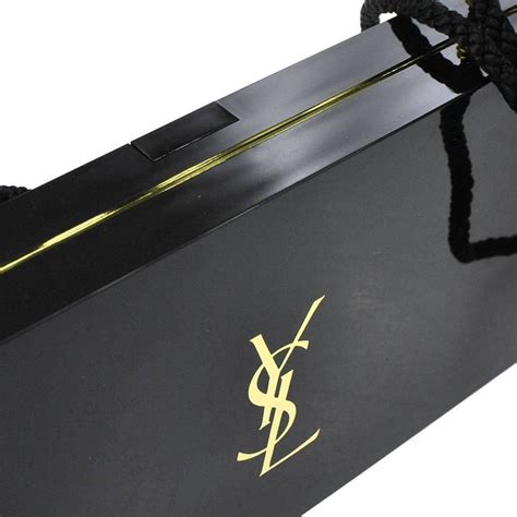 tangs ysl|YSL gold makeup case.